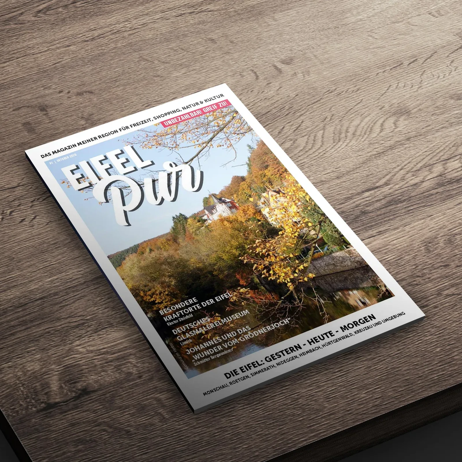 Eifel Pur Magazin als gedrucktes Heft auf dem Tisch — Magazinsatz und Editorial Design von eoglou aus Aachen